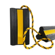 Černo-žlutý gumový zakládací klín pod kola FLOMA AWCF46 - 30 x 14 x 12,5 cm