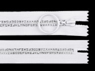 Kostěný zip šíře 5 mm délka 16 cm písmenka - zvětšit obrázek